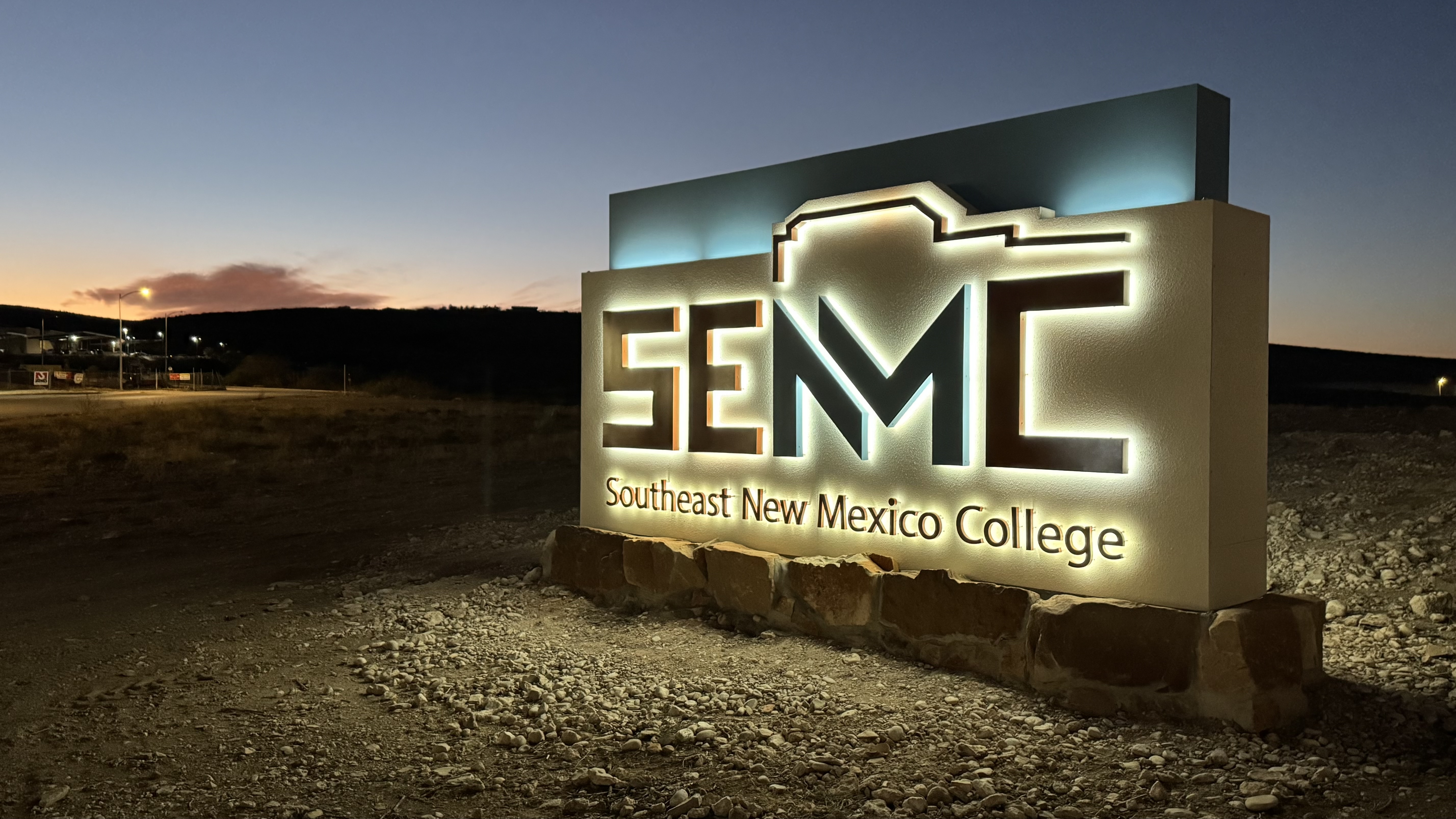 SENMC sign at night